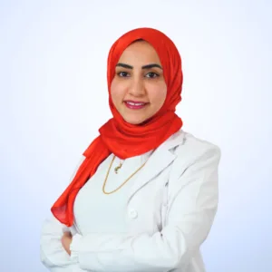 Dr. Mona Negm, Specialist Dermatologist at Azura Clinic Muscat, wearing a white medical coat for professional dermatology, skin care, and aesthetic treatments