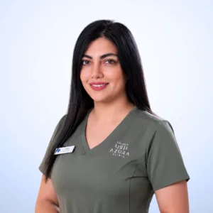 Ms. Sadaf, Laser Technician and Aesthetic Therapist at Azura Clinic Muscat, wearing Azura medical scrubs for laser treatments, skincare, and aesthetic care