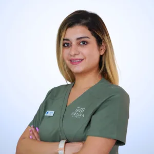 Ms. Kimia, nurse at Azura Clinic Muscat, in clinic uniform for professional dermatology and aesthetic patient care