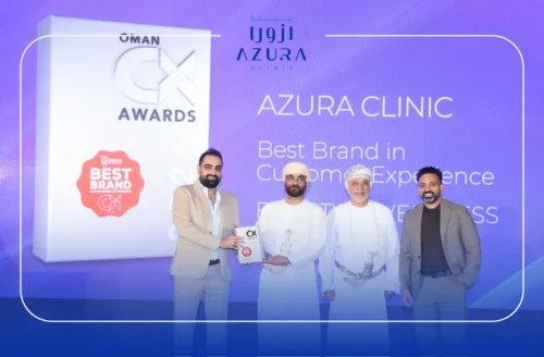 Azura Clinic receiving the Best Brand in Customer Experience award at the Oman CX Awards 2026 ceremony in Oman